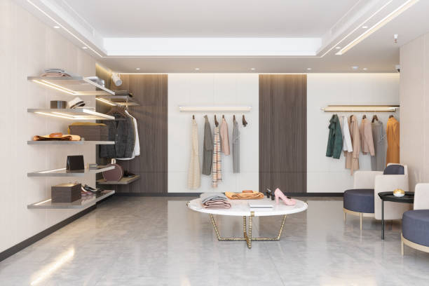Luxury Clothing Store With Clothes, Shoes And Other Personal Accessories. rénovation boutique à Lyon 2